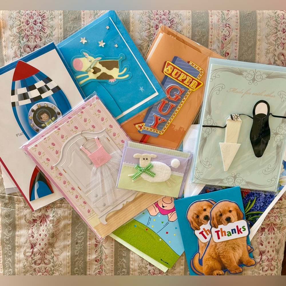 collection of 12 assorted greeting cards that feature various designs and themes